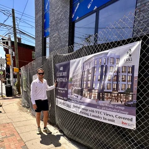Bruce Elia Jr. in front of one of his New Jersey developments, a new luxury rental building